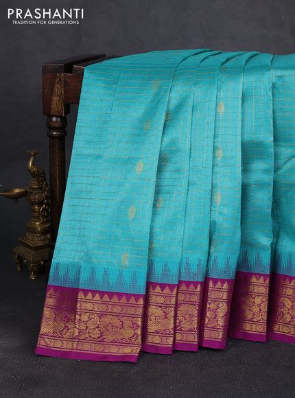 Silk cotton saree teal blue and purple with allover zari checks & buttas and temple design zari woven korvai border