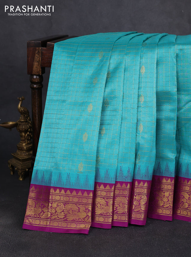 Silk cotton saree teal blue and purple with allover zari checks & buttas and temple design zari woven korvai border
