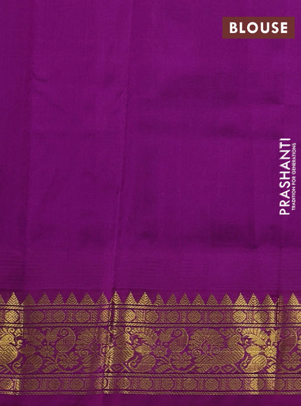 Silk cotton saree teal blue and purple with allover zari checks & buttas and temple design zari woven korvai border