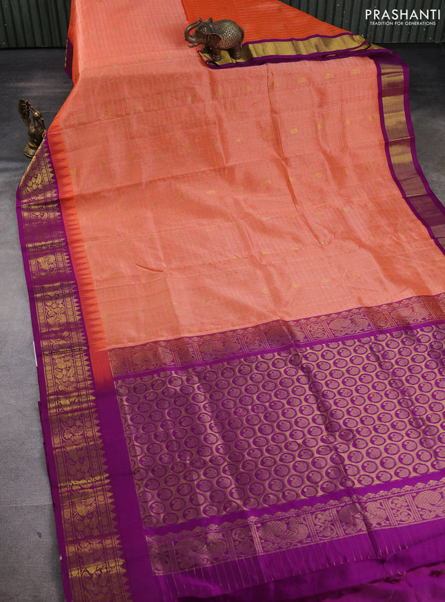 Silk cotton saree orange and purple with allover zari checks & buttas and temple design zari woven korvai border