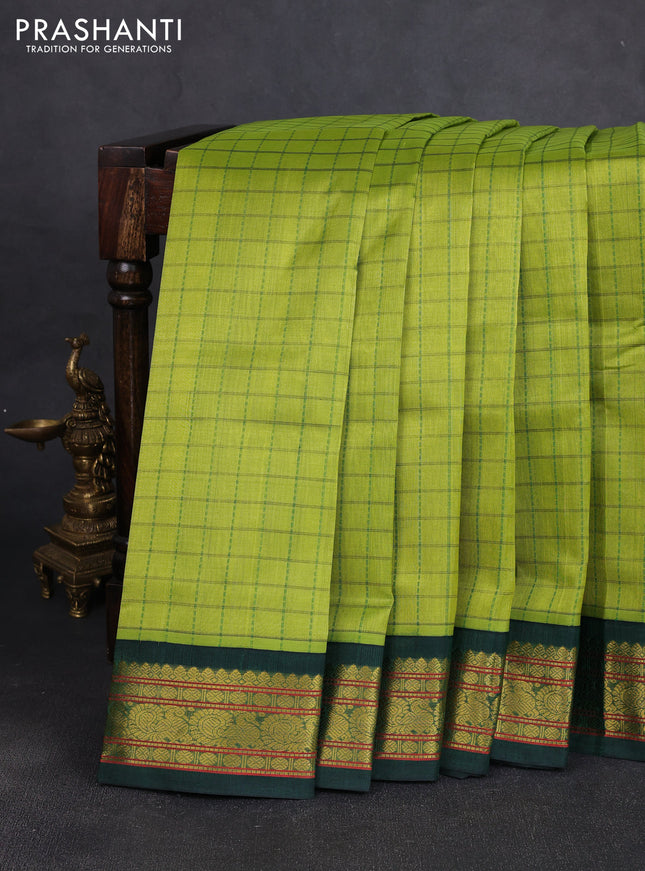 Silk cotton saree light green and bottle green with allover checked pattern and zari woven korvai border