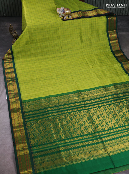 Silk cotton saree light green and bottle green with allover checked pattern and zari woven korvai border