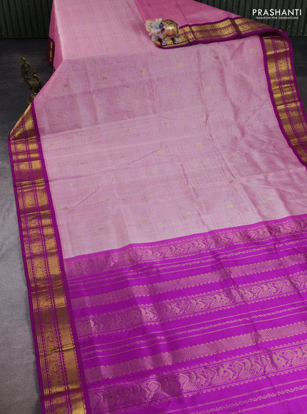 Silk cotton saree light pink and purple with allover zari checks & paisley buttas and zari woven korvai border