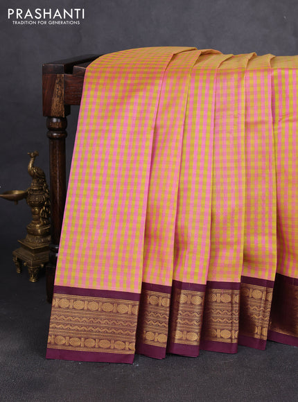 Silk cotton saree pink & yellow and deep wine with allover zari checks & paisley buttas and zari woven korvai border