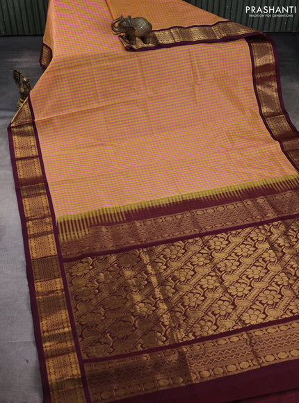 Silk cotton saree pink & yellow and deep wine with allover zari checks & paisley buttas and zari woven korvai border