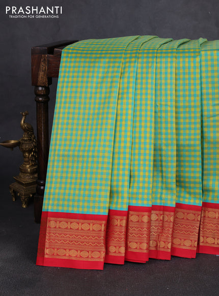 Silk cotton saree teal blue & yellow and red with allover zari checks & paisley buttas and zari woven korvai border