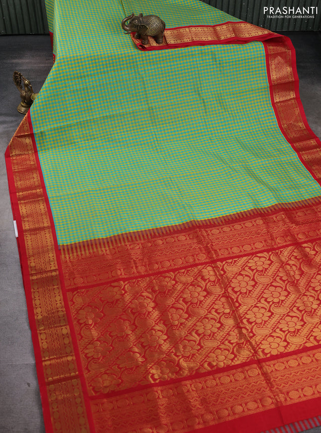 Silk cotton saree teal blue & yellow and red with allover zari checks & paisley buttas and zari woven korvai border