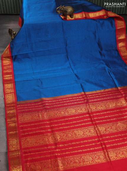 Silk cotton saree peacock blue and red with plain body and zari woven korvai border