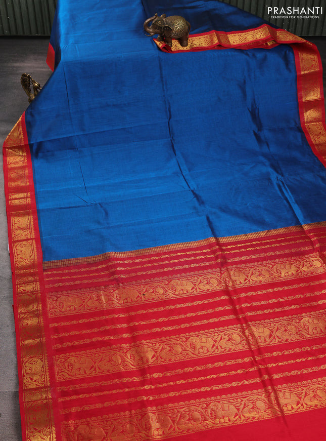 Silk cotton saree peacock blue and red with plain body and zari woven korvai border