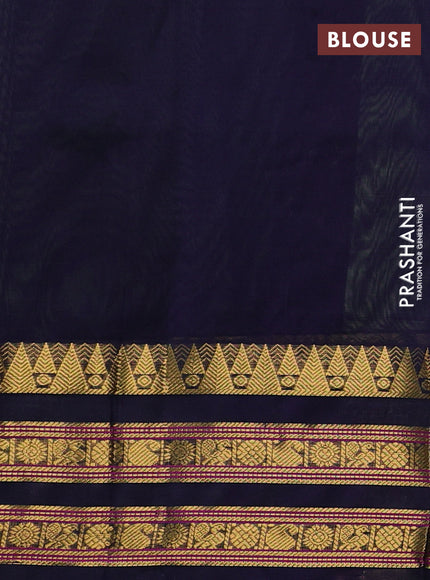 Silk cotton saree pista green and navy blue with allover zari checked pattern and temple zari woven korvai border
