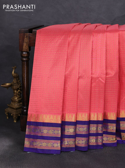Silk cotton saree peach pink and blue with allover zari checked pattern and temple zari woven korvai border