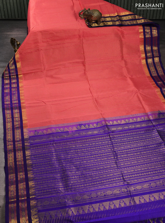 Silk cotton saree peach pink and blue with allover zari checked pattern and temple zari woven korvai border