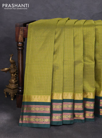 Silk cotton saree mehendi green and bottle green with allover zari checked pattern and temple zari woven korvai border