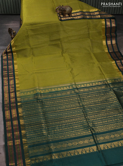 Silk cotton saree mehendi green and bottle green with allover zari checked pattern and temple zari woven korvai border
