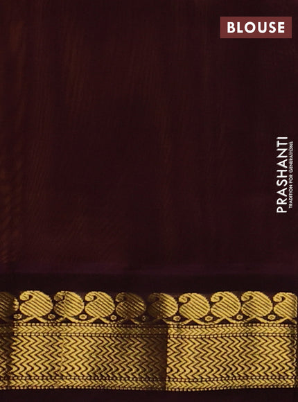 Silk cotton saree yellow and coffee brown with plain body and zari woven korvai border