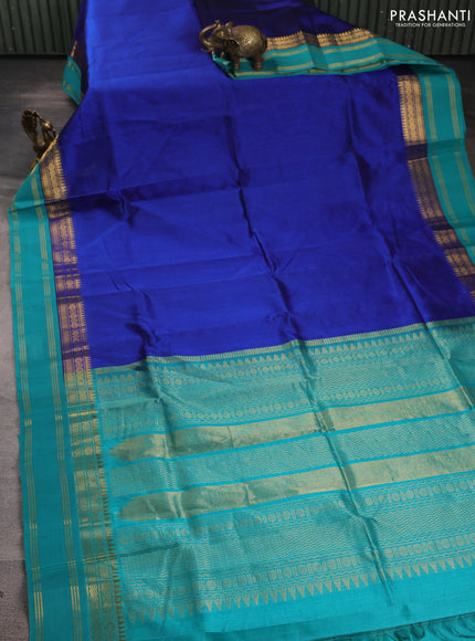 Silk cotton saree peacock blue and teal blue with plain body and temple design rettapet zari woven border