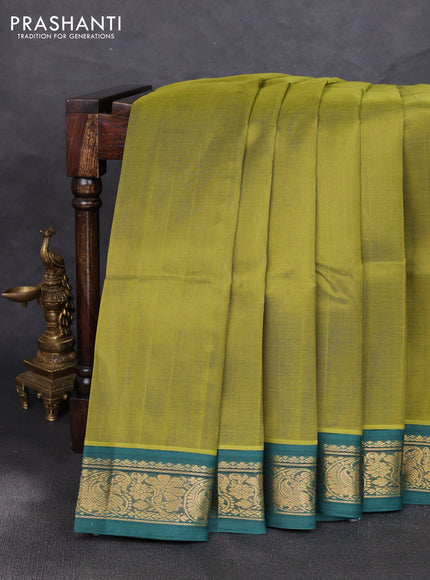 Silk cotton saree mehendi green and green with plain body and zari woven korvai border