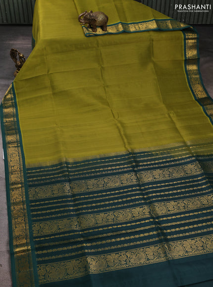 Silk cotton saree mehendi green and green with plain body and zari woven korvai border
