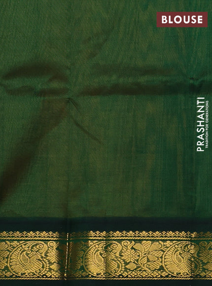 Silk cotton saree sandal and bottle green with plain body and zari woven korvai border