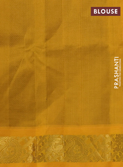 Silk cotton saree green and yellow with plain body and zari woven korvai border