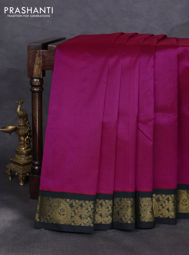 Silk cotton saree pink and bottle green with plain body and zari woven korvai border