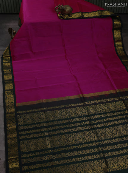 Silk cotton saree pink and bottle green with plain body and zari woven korvai border