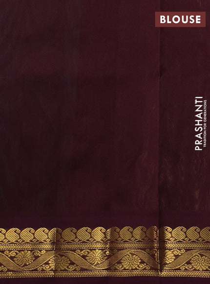 Silk cotton saree teal blue and deep maroon with plain body and zari woven korvai border