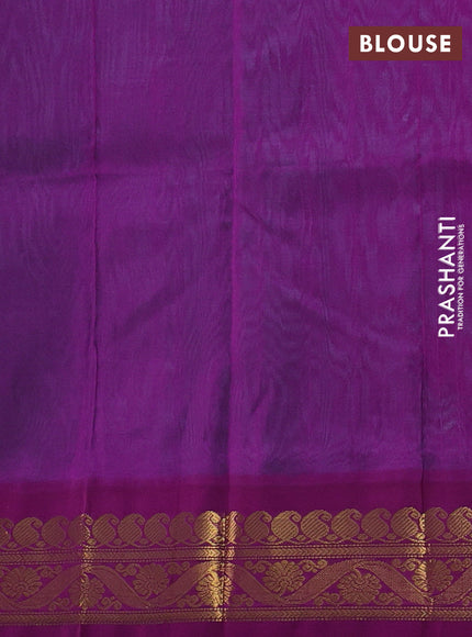 Silk cotton saree teal blue and purple with plain body and zari woven korvai border