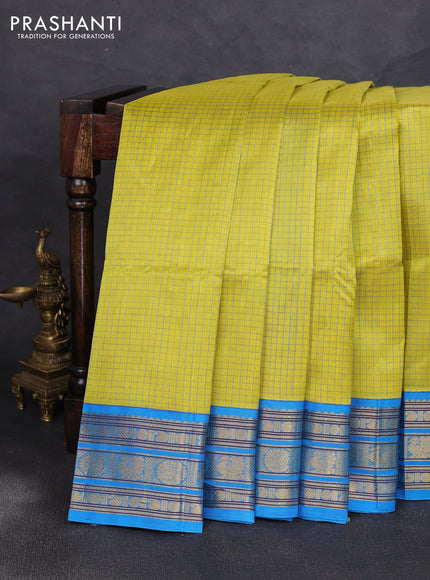 Silk cotton saree lime green and cs blue with allover small checked pattern and zari woven korvai border