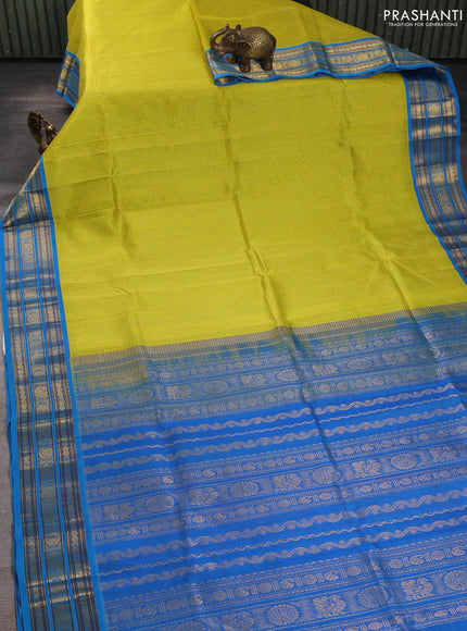 Silk cotton saree lime green and cs blue with allover small checked pattern and zari woven korvai border
