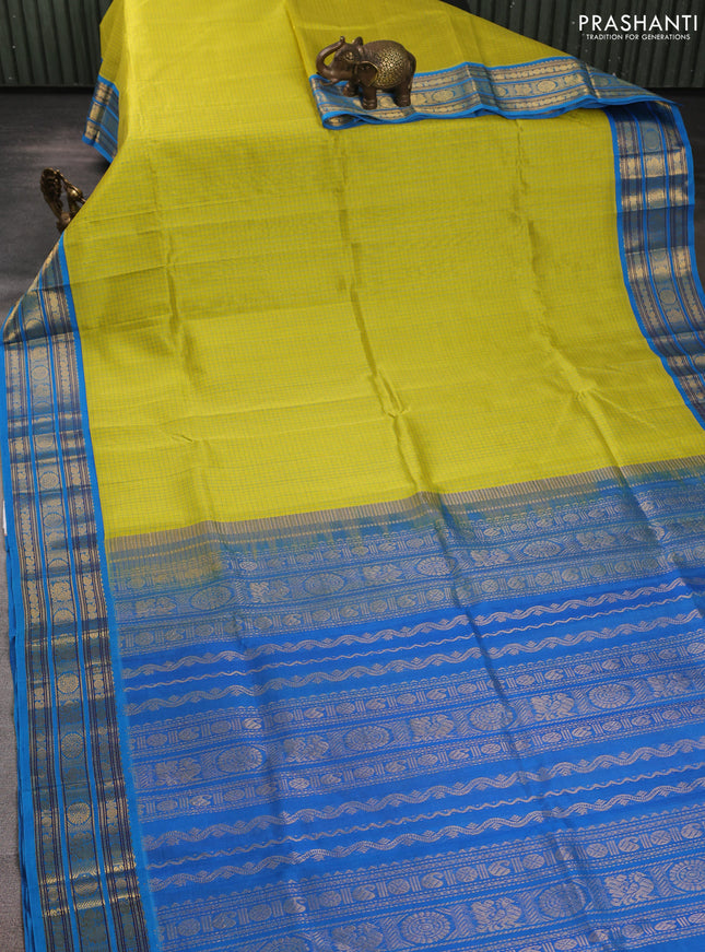 Silk cotton saree lime green and cs blue with allover small checked pattern and zari woven korvai border