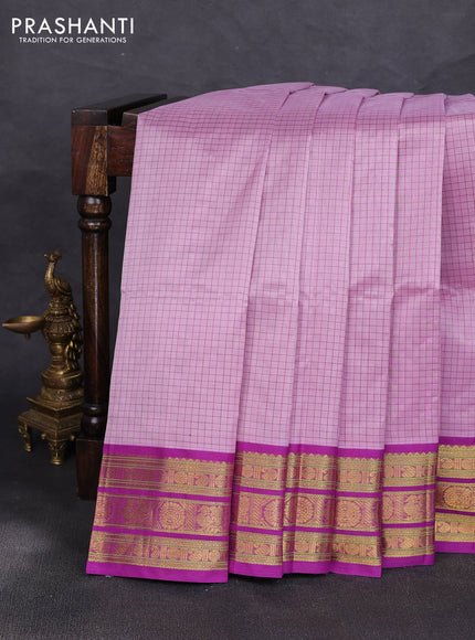 Silk cotton saree lavender and purple with allover small checked pattern and zari woven korvai border
