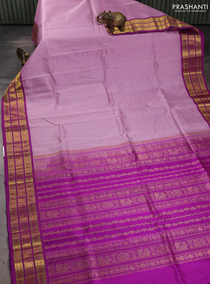 Silk cotton saree lavender and purple with allover small checked pattern and zari woven korvai border
