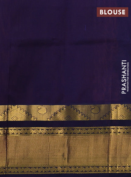 Silk cotton saree peach pink and navy blue with allover small checked pattern and temple zari woven korvai border