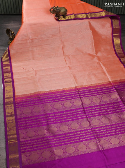 Silk cotton saree peach orange and purple with plain body and rudraksha zari woven korvai border