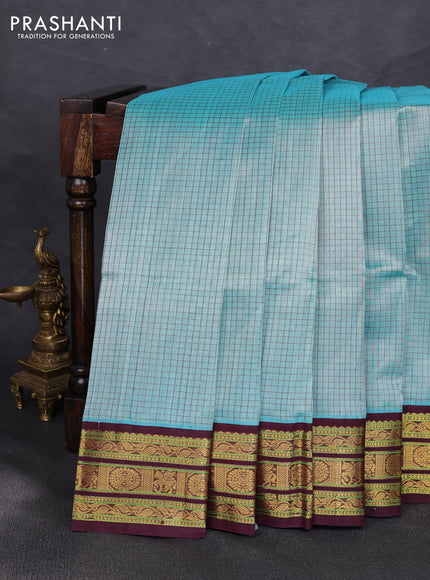 Silk cotton saree teal blue and deep maroon with allover small checked pattern and zari woven korvai border