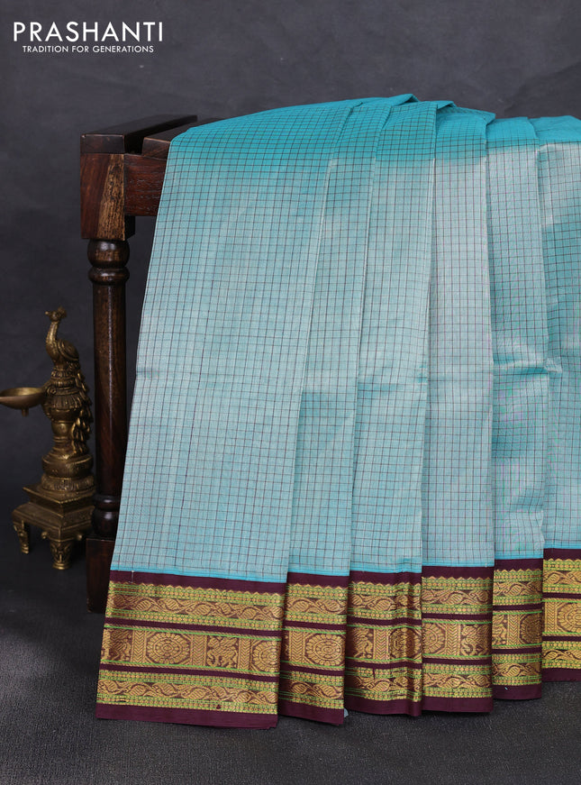 Silk cotton saree teal blue and deep maroon with allover small checked pattern and zari woven korvai border