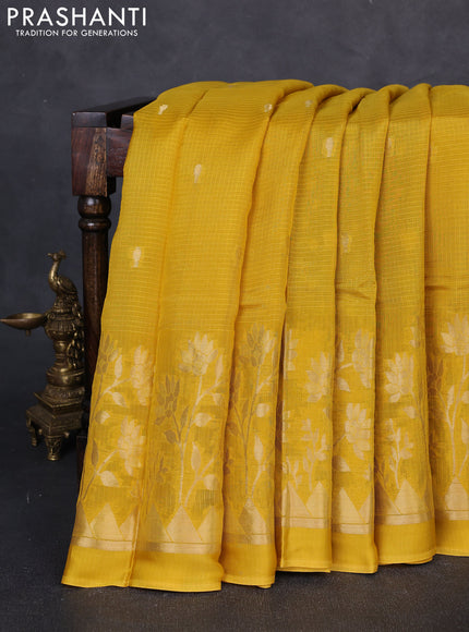Art kota silk saree mustard yellow and bottle green with allover zari woven buttas and floral zari woven border