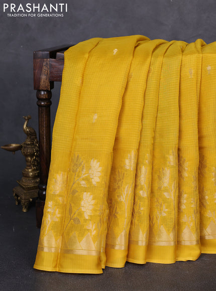 Art kota silk saree mustard yellow and bottle green with allover zari woven buttas and floral zari woven border