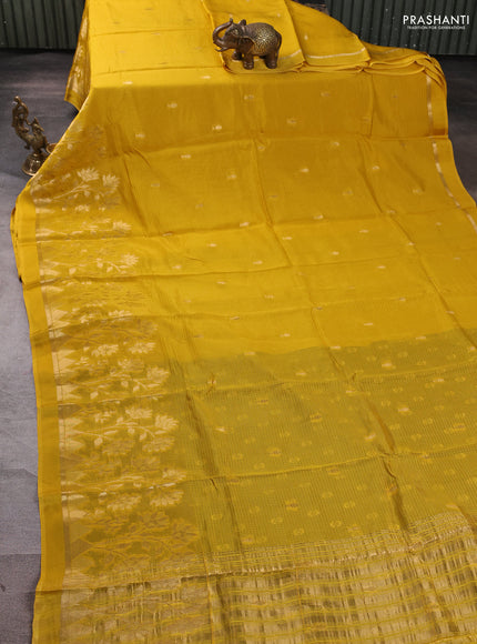 Art kota silk saree mustard yellow and bottle green with allover zari woven buttas and floral zari woven border
