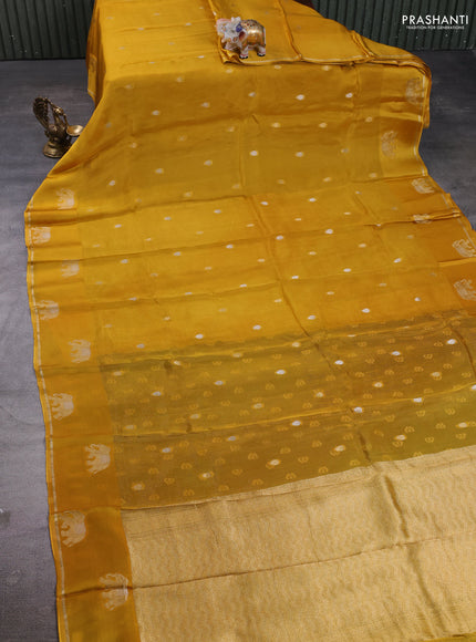 Art kota silk saree mustardf yellow and green with allover silver & zari woven buttas and elephant design zari woven border
