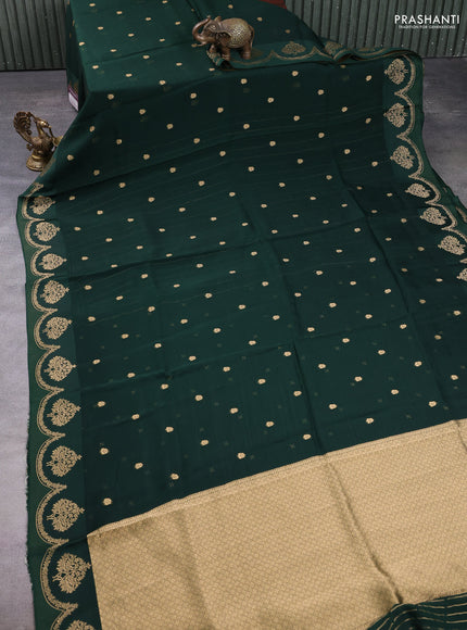 Art kota silk saree bottle green with allover zari woven buttas and floral zari woven butta border