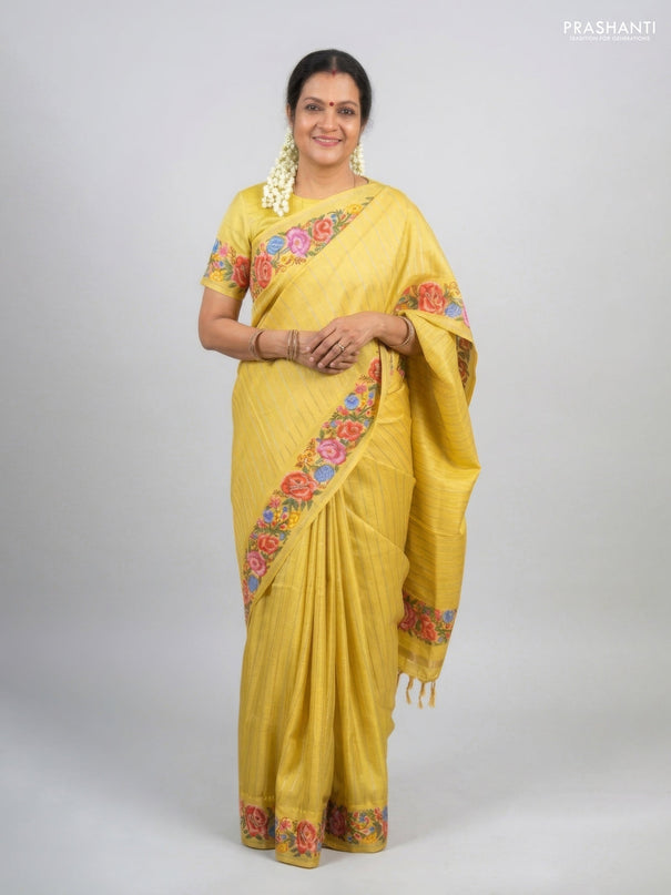 Semi tussar saree yellow with allover zari stripe pattern and floral embroidery border