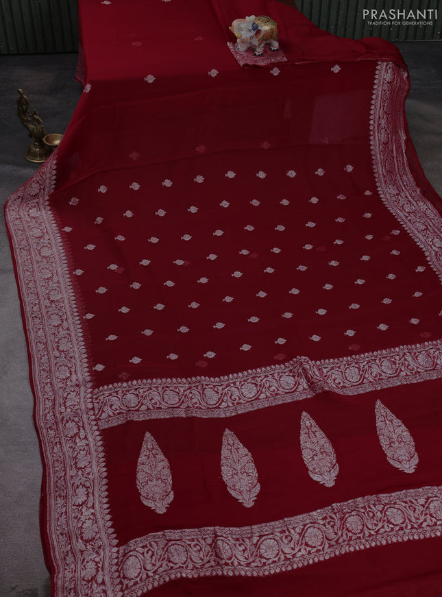 Banarasi chiffon saree maroon with allover silver zari woven buttas and silver zari woven floral border