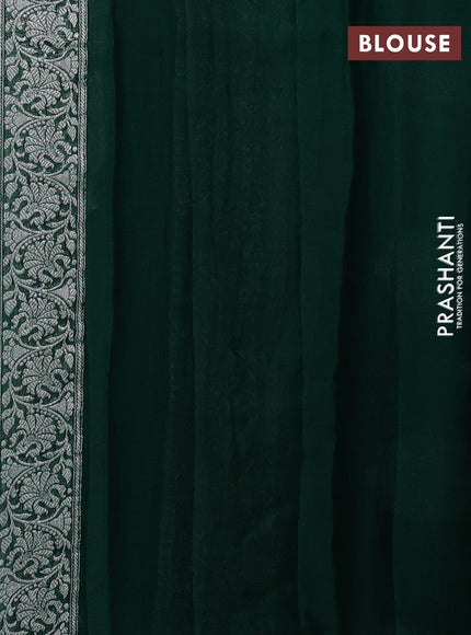 Banarasi chiffon saree bottle green with allover silver zari woven buttas and silver zari woven floral border
