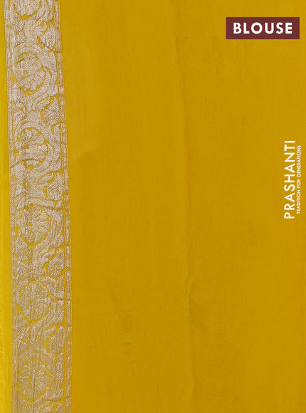 Banarasi chiffon saree yellow with allover silver zari woven buttas and silver zari woven floral border