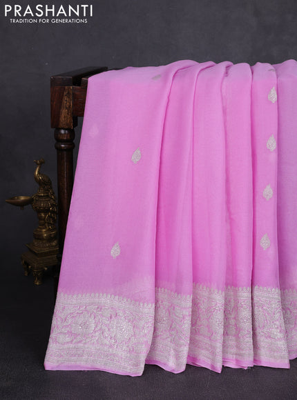 Banarasi chiffon saree lotus pink with allover silver zari woven buttas and silver zari woven floral border
