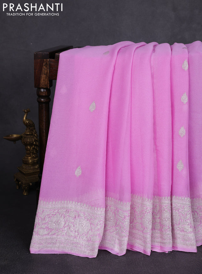 Banarasi chiffon saree lotus pink with allover silver zari woven buttas and silver zari woven floral border