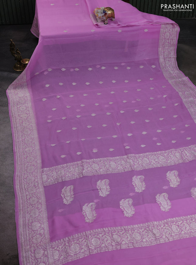 Banarasi chiffon saree lotus pink with allover silver zari woven buttas and silver zari woven floral border