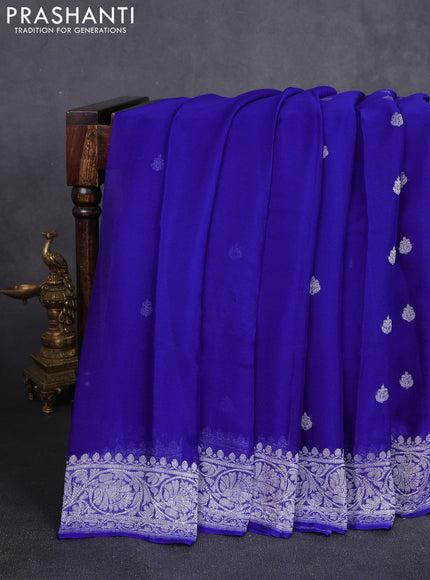 Banarasi chiffon saree royal blue with allover silver zari woven buttas and silver zari woven floral border